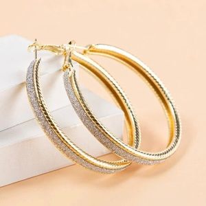 Gold and glitter hoops.
